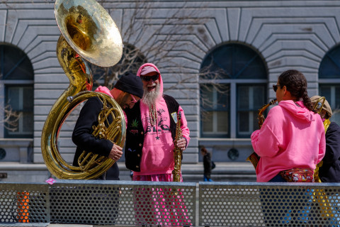 sax and tuba players in pink